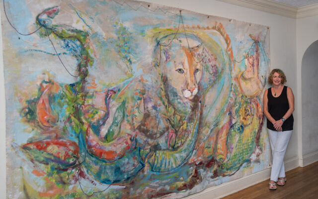 Photos by Howard Mendel //
Linda Mitchell painted “Entropy: Wildcat” on fabric.