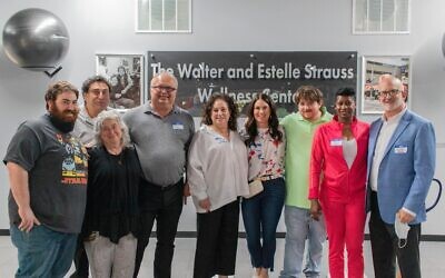 Dr. Scott Karlin (far right) and wife Jodi (flowered shirt) with Sandra Spielberger (center), Michelle Schwartz (far left), and family and friends.