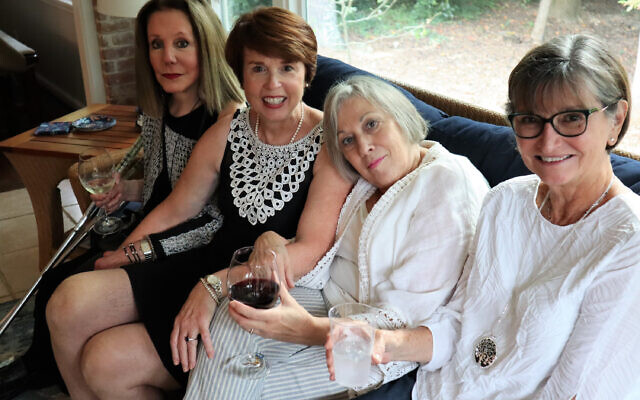Marilyn Holzer with her cousin, Debbie Nelson, and sisters-in-law Alice and Janet Byrne on Rosh Hashanah.