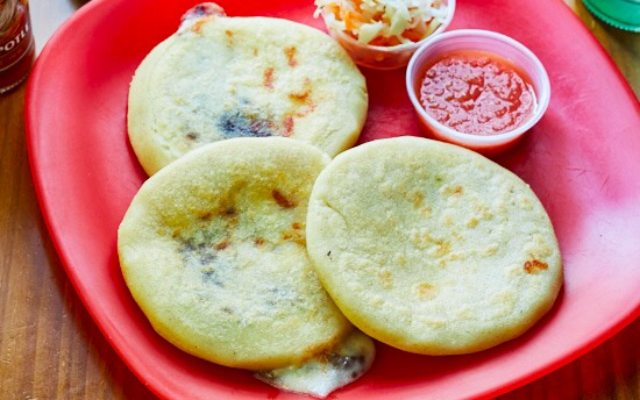 Pupusas are a handheld tortilla that are stuffed.