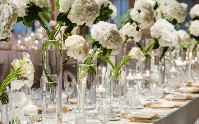 The tables echoed their pristine white “dream” theme. //Photo by Carter Rose Weddings