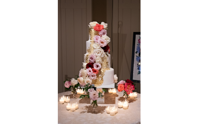 The vanilla butter cream wedding cake echoed the floral theme.