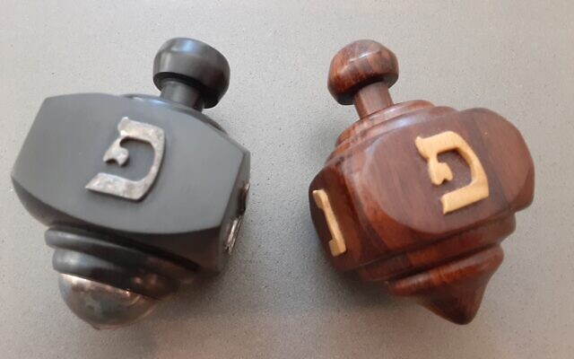 Israeli dreidels from Solon’s parents with the letter “peh” instead of “shin.”