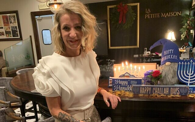 Owner Stephanie Jaouen-Spells welcomed guests this year with a Chanukah menorah.
