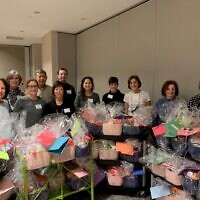 Temple Sinai spent Nov. 21 assembling welcome gift bags for Afghan families arriving in Atlanta.