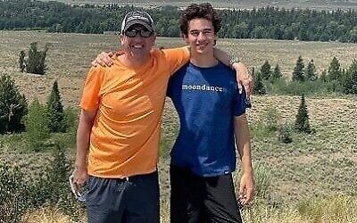 Josh and Charlie in front of the Teton Range at one of the Jackson Hole overlooks.