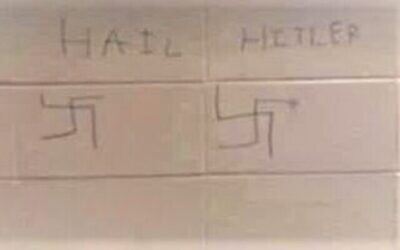 Pope High School reported two incidents of anti-Semitic graffiti, one of which included a swastika and read "hail Hitler".