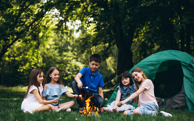 Group of kids in forest by bonfire with mushmellows. created by senivpetro