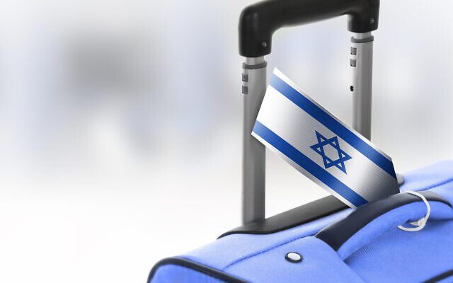 Destination Israel. Blue suitcase with flag.