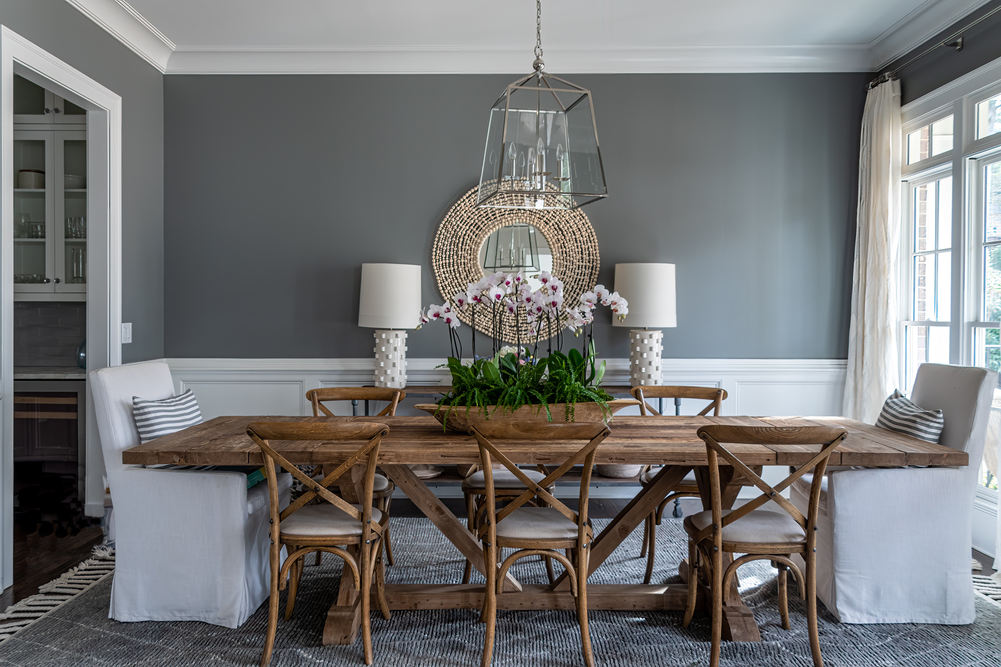 The dining table is reclaimed wood from Restoration Hardware.
