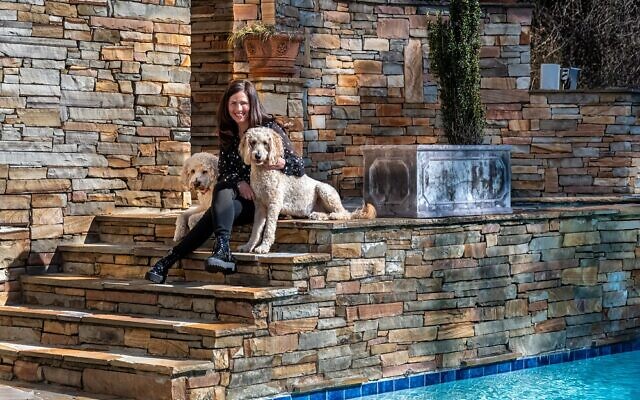 Jody enjoys time with Kosmo and Lacy as she takes inspiration from the swimming pool’s reflection and brilliance.