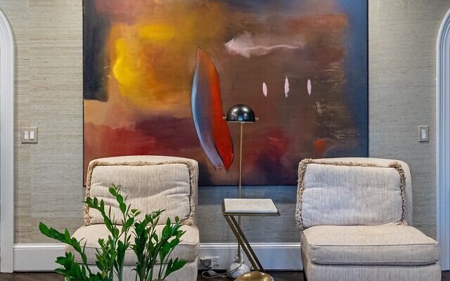 A large oil painting by patient Hal Schwartz hangs in the Goldsteins’ great room.