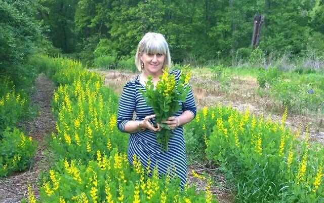 Dawn Siegel picks stunning flowers on their farm in the North Georgia Mountains.