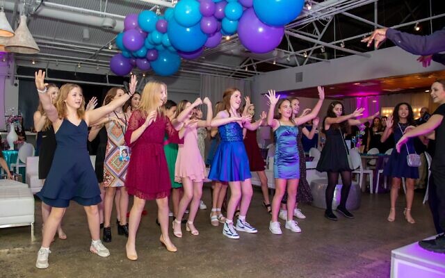 Izzy and friends dance at her bat mitzvah // Dani Weiss Photography.