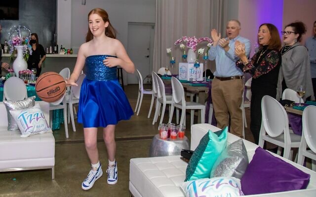 Izzy, the basketball lover, dribbles into the party in her high-top sneakers // Dani Weiss Photography.