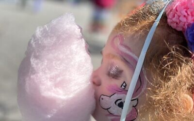 Face-painting and candy from Cotton Cravings were two festival highlights.