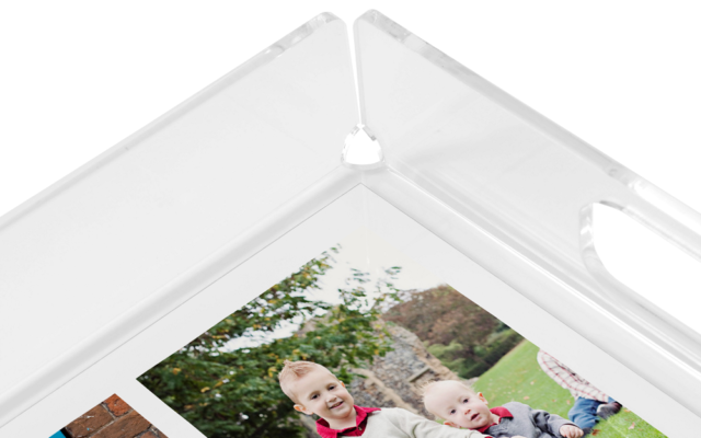 An acrylic photo tray is the ideal gift to preserve memories.