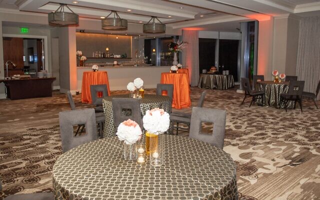J. Wilbur Smith’s décor built on Carole’s idea of black and white with orange splashes. // J. Wilbur Smith EventScapes