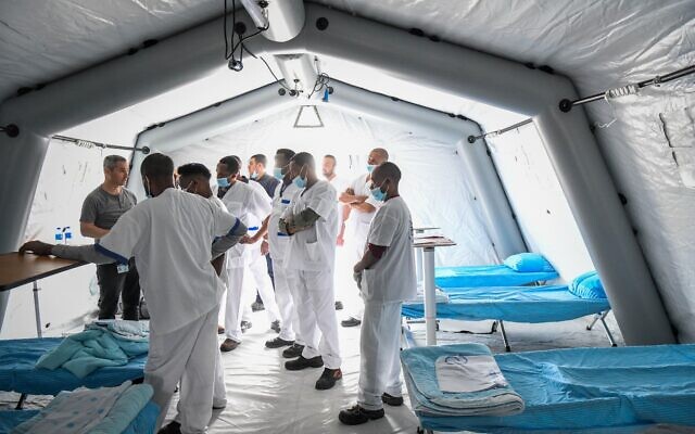 Medical Center workers training at a model field hospital similar to the ones set up in Ukraine for the wounded taken on March 8. // credit Flash90
