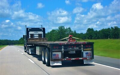Driving back to Savannah from Hilton Head, Goldstein shot this giant flatbed truck carrying only a small tricycle.