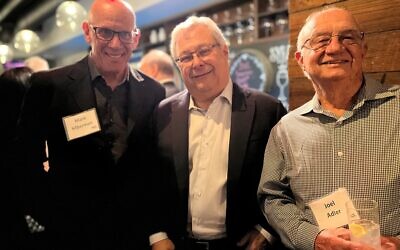 Steve Koonin (center) welcomed Mark Silberman and Dr. Joel Adler during the cocktail hour.