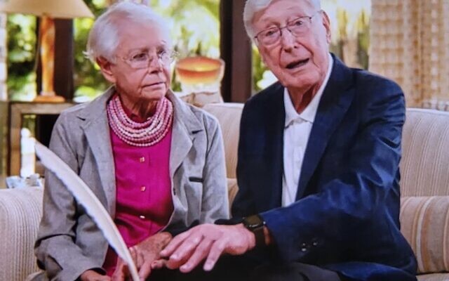 Billi and Bernie Marcus are pictured speaking from their home in Florida during the dedication of the new underground blood bank in Israel.