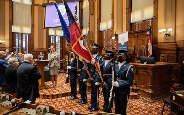 The Lovejoy High School Junior ROTC performed the Presentation of Colors, with Commissioner of Veterans Service Patricia Ross leading the Pledge of Allegiance.
