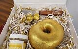 Goldbergs created this special golden bagel in honor of their golden anniversary, celebrating 50 years as an Atlanta institution.