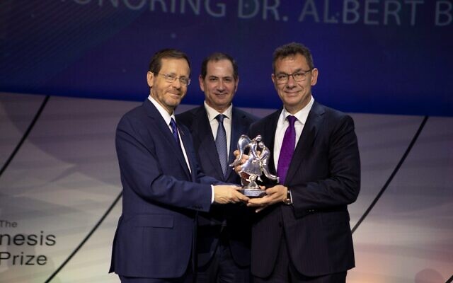 Pfizer CEO Dr. Albert Bourla (right) is presented the 2022 Genesis Prize for his leadership and contribution to humanity during the COVID-19 pandemic. // Photo Credit: Lior Mizrahi, Getty