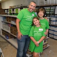 Director of Operations Jonathan Halitsky with his daughter and board member Debbie Sonenshine at a recent Community Buddies event. // Credit: Jonathan Ginsberg