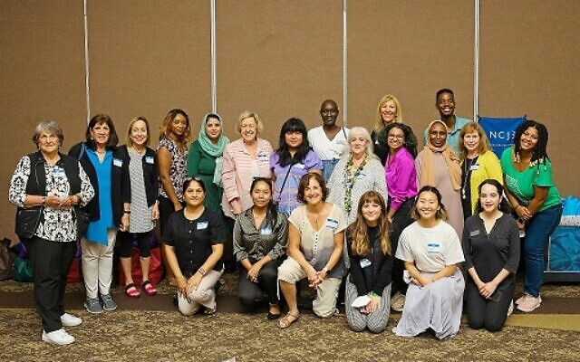 Photo of New American Pathways staff and NCJW Atlanta leaders.