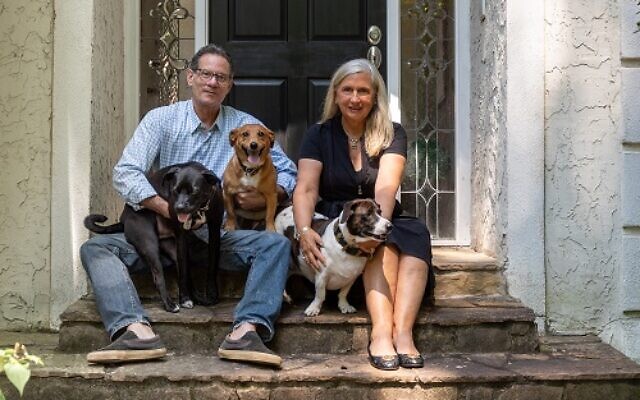 Dave and Christiane welcome guests with their three dogs — Mojo, Polo and Coco.