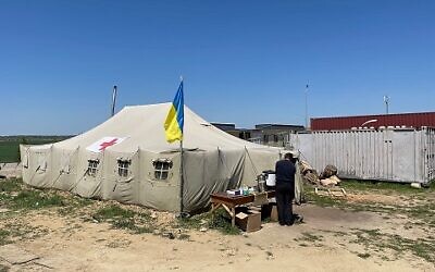 Red Cross tent set up on the Ukrainian side of the border crossing containing minimal supplies and amenities. //Photo Credit: Brian Shmerling