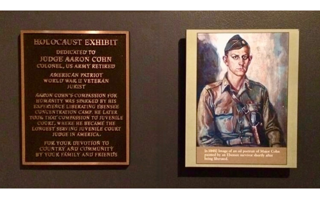 A plaque dedicated to Cohn’s father, Judge Aaron Cohn. The portrait in uniform was painted by a survivor in Ebensee concentration camp in May 1944.