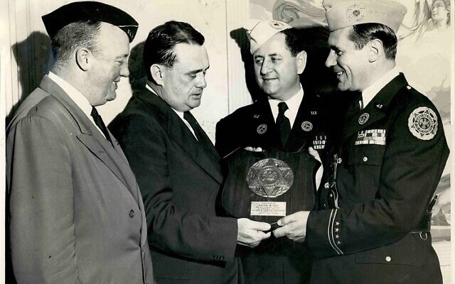 Ralph McGill, editor of the Atlanta Constitution (second from left), receives an award in July 1947 from the Georgia Department of the Jewish War Veterans for his “untiring efforts in combating the forces of bigotry.” // Provided by The William Breman Jewish Heritage Museum