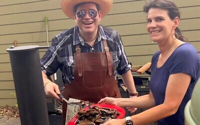 Ryan Posner and Ana Posner serve up some grilled Portobello mushrooms at their Grant Park home.