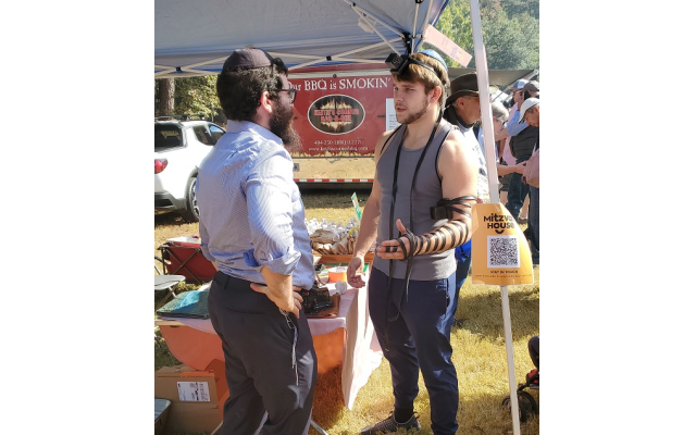 Festival attendees were given the option to be wrapped in tefillin while enjoying the festival.