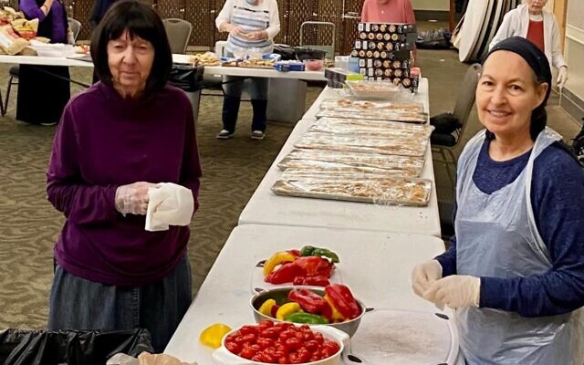 It was all hands on deck while preparing for the lavish, outsized gathering in Toco Hills at Congregation Beth Jacob as part of the Shabbat Block Party: A Gala Kiddush.