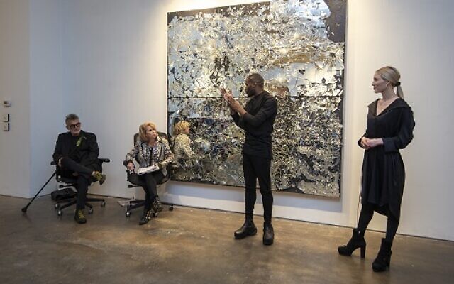 (From left) Featured artist Michael David, Marcia Jaffe and Bill Lowe Gallery director Donovan Johnson.