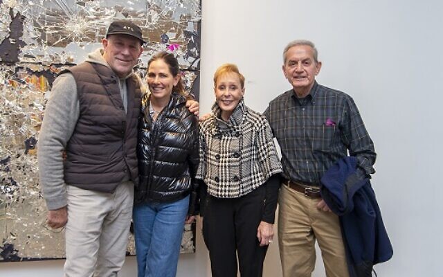 Carey and Jody Goldstein pose with Jody and Ramon Franco by a Michael David piece // Photo by Heidi Morton Photography