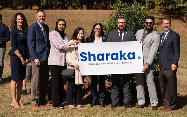 The Sharaka delegation at planting of a “peace tree” in Atlanta’s Freedom Park. From left: Karen Isenberg Jones, director of government affairs, consulate general of Israel; Commissioner Justin Cutler, department of parks and recreation; Fatema Alharbi, from Bahrain; Ibtissame Azzaoui, from Morocco; Israeli Consul General Anat Sultan Dadon; Israeli Deputy Consul General Alex Gandler; Dan Fefferman, from Israel; and Atlanta City Council President Doug Shipman // Photo provided by the Israeli Consulate