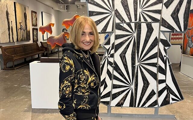 Art icon Fay Gold admires Rose’s black and white kimono cast from seven pieces of glass.