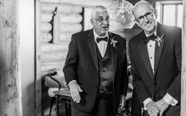 Father of the bride, local physician Nathan Segall, (right) posed with father of the groom, Dave Jones.