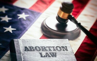 Fulton County Superior Court Judge Robert McBurney ruled that the six-week, state abortion ban, enacted in 2019, was void from the beginning because the Georgia Constitution prohibits the legislature from passing laws that violate federal constitutional precedent.