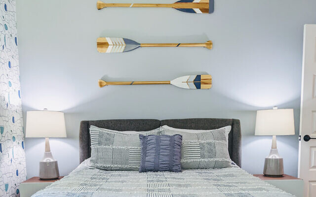 The Hayes’ son’s room theme was carried through with hand painted oars // Photo by Kate Kolouris