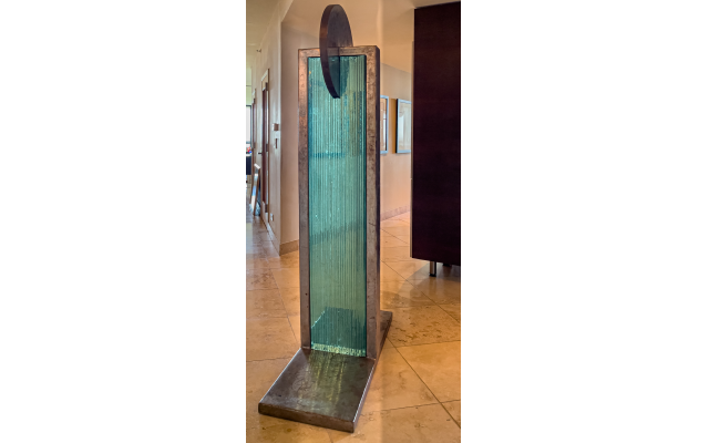 This 6-foot-tall steel and glass sculpture, “Caduceus,” one of a kind by Virginia Hoffman