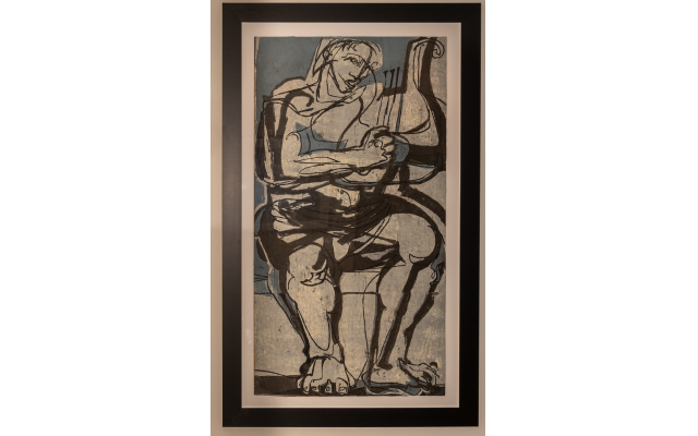 This Ben Smith wood block is “Man Playing the Lyre” (1966)