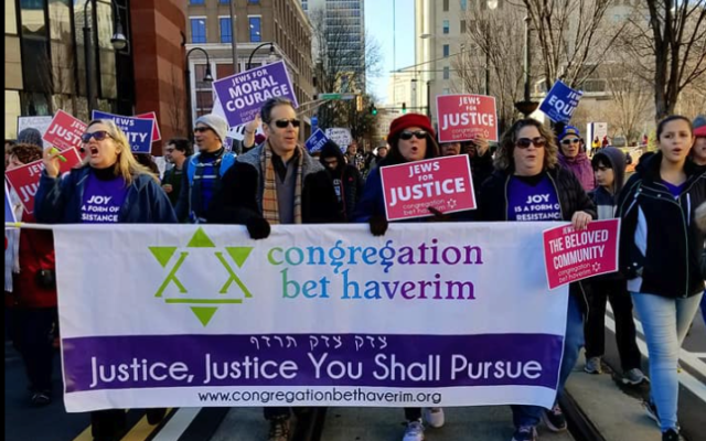 Members of Congregation Bet Haverim march in protest for social justice.