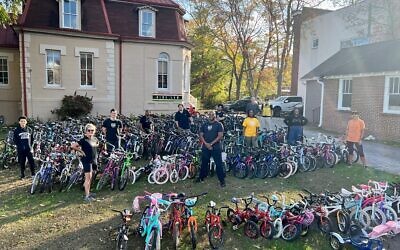Hagen Rosskopf’s team before loading all the collected bikes onto trucks to deliver to Free Bikes 4 Kidz ATL in November 2022.