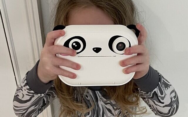 Poppy Reese spotting things around the house with her Kidamento camera.